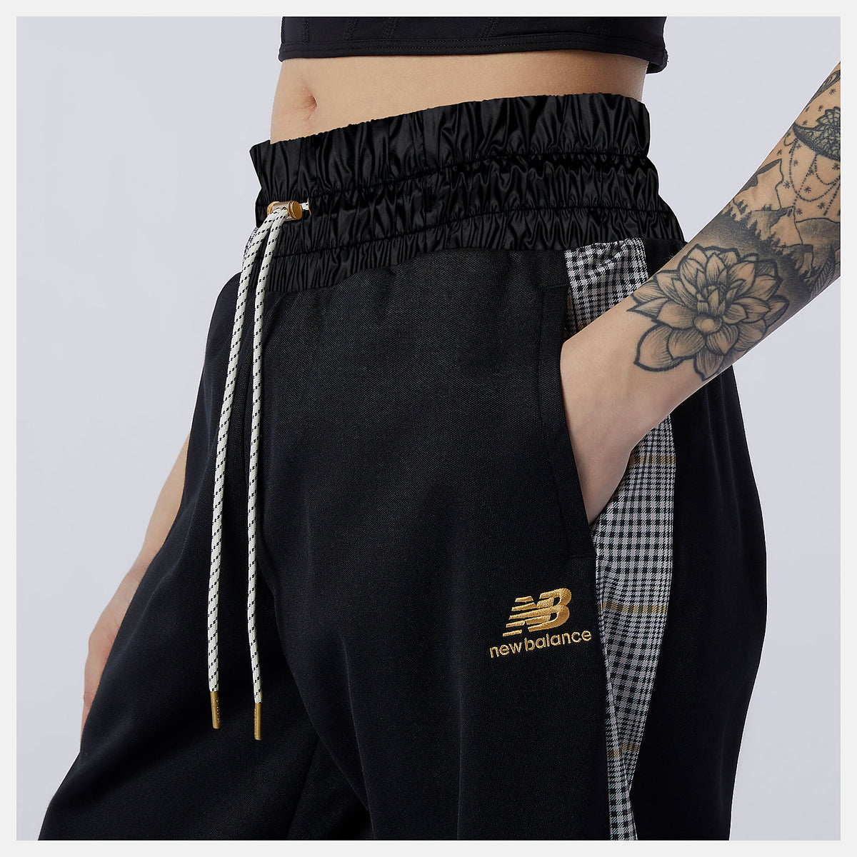 Black NB Athletics Higher Learning Stripe Track Pant | New Balance Clothing