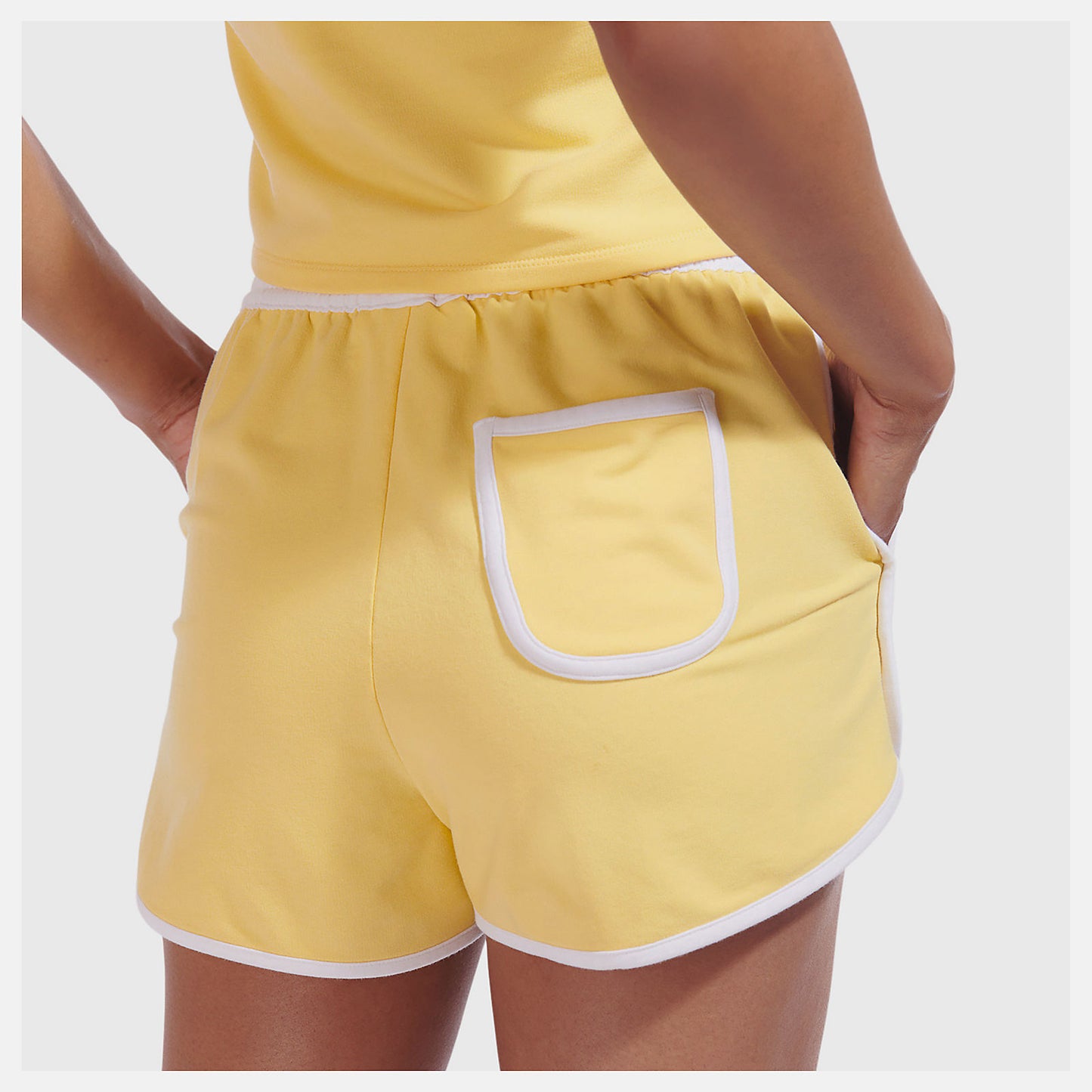 Yellow NB x Staud Terry Run Short | New Balance Clothing