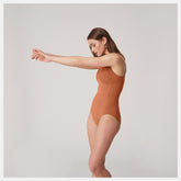 Terra Cotta Bandier Brief Bodysuit | New Balance Clothing
