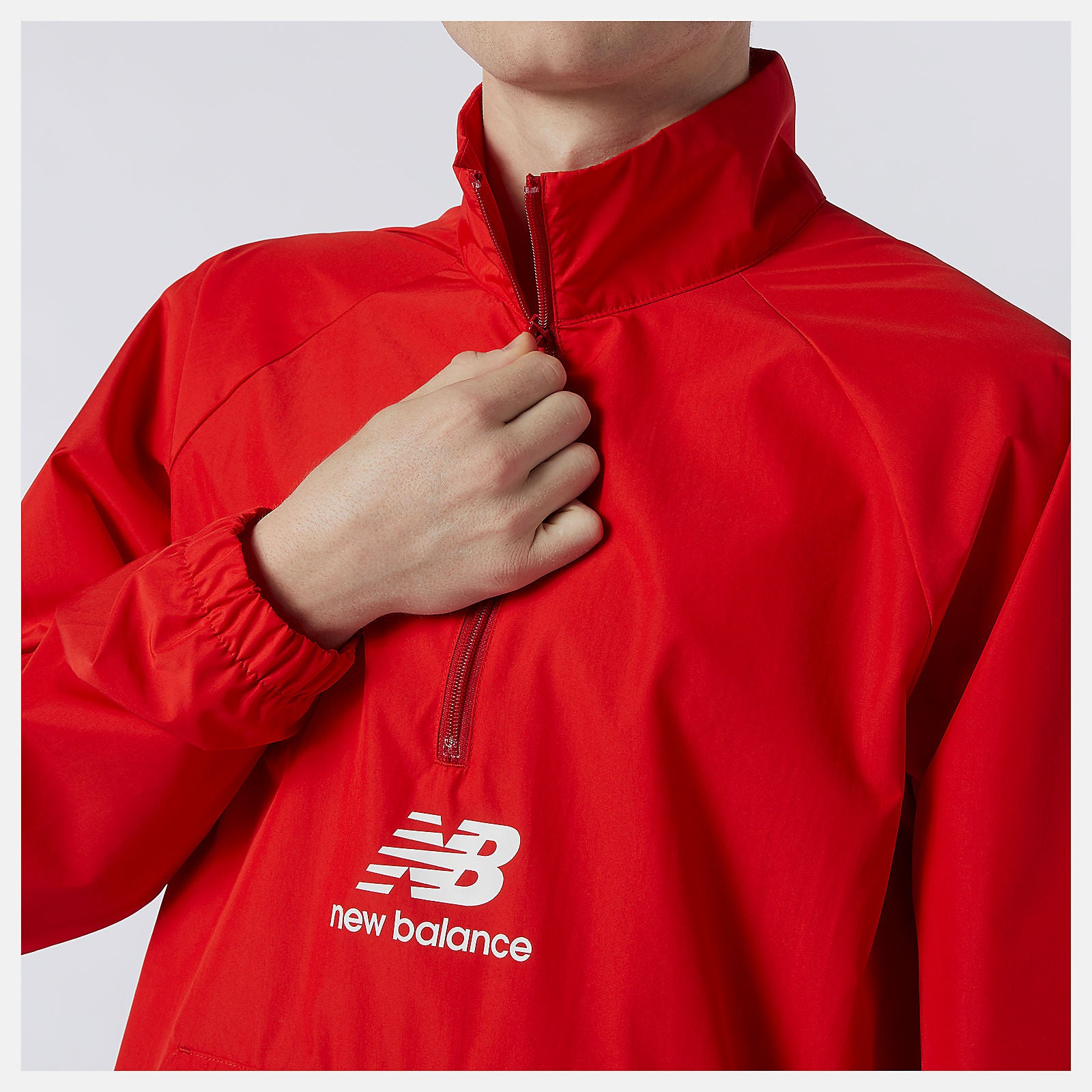 Team Red Inline NB Essential Anorak | New Balance Clothing