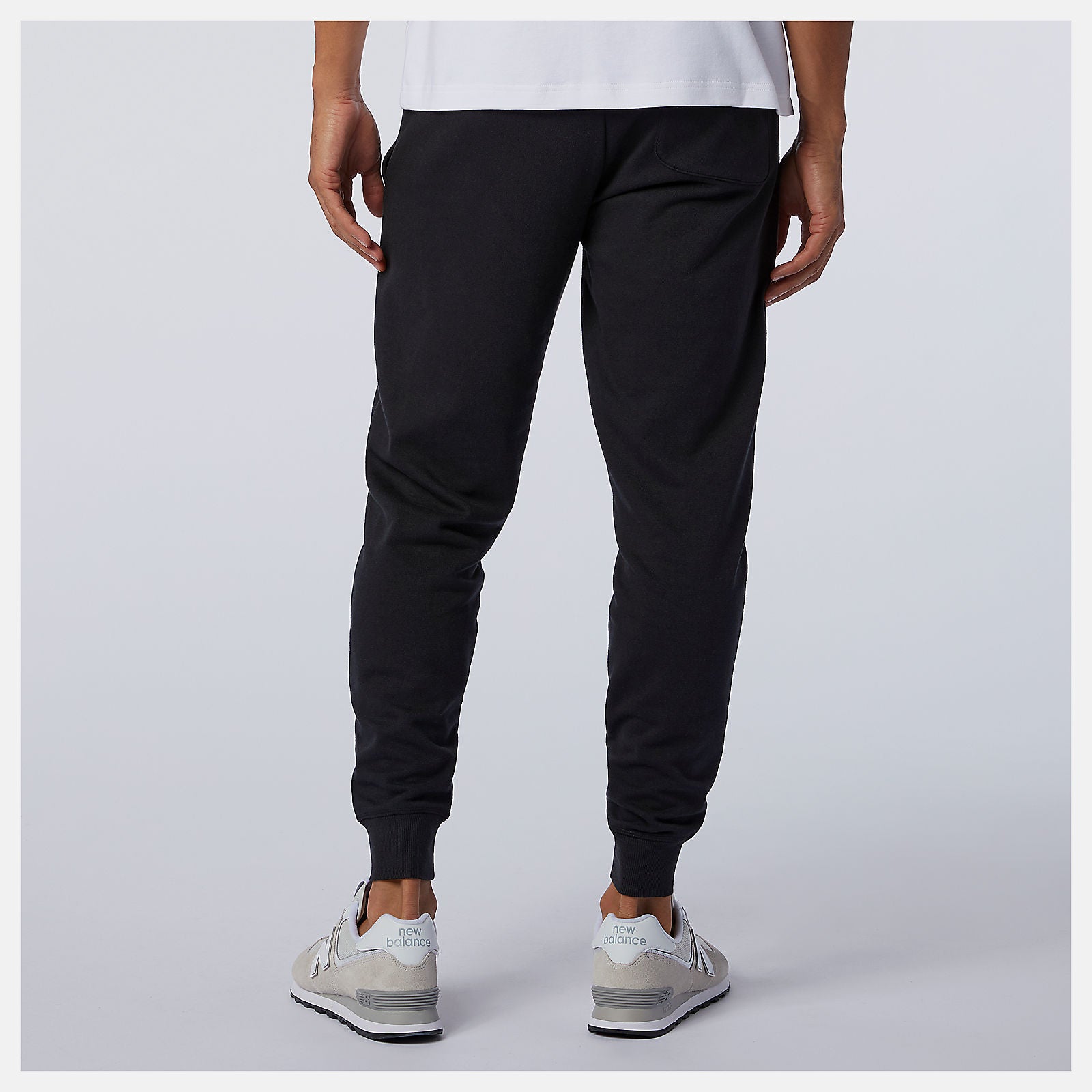 Black Essentials Stacked Logo Sweatpant | New Balance Clothing