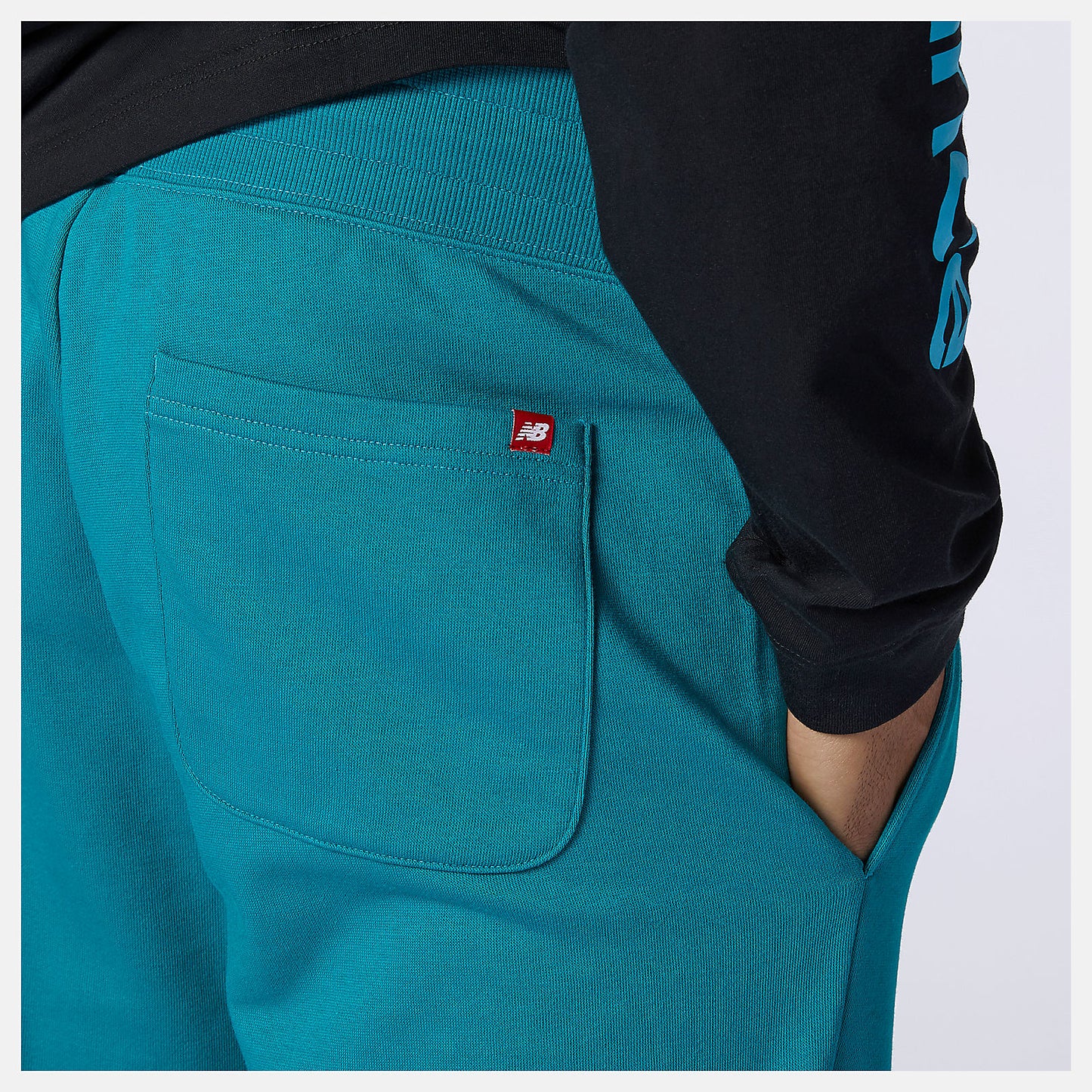 Team Teal NB Essentials Embroidered Pant | New Balance Clothing