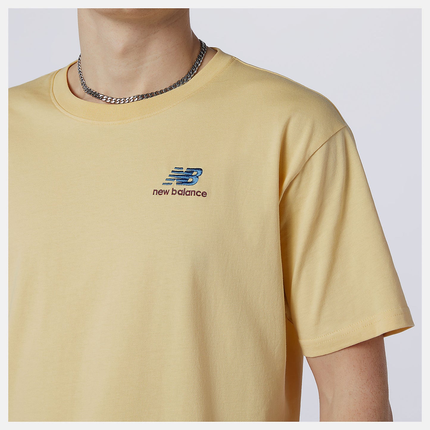 Yellow NB Essentials Embroidered Tee | New Balance Clothing