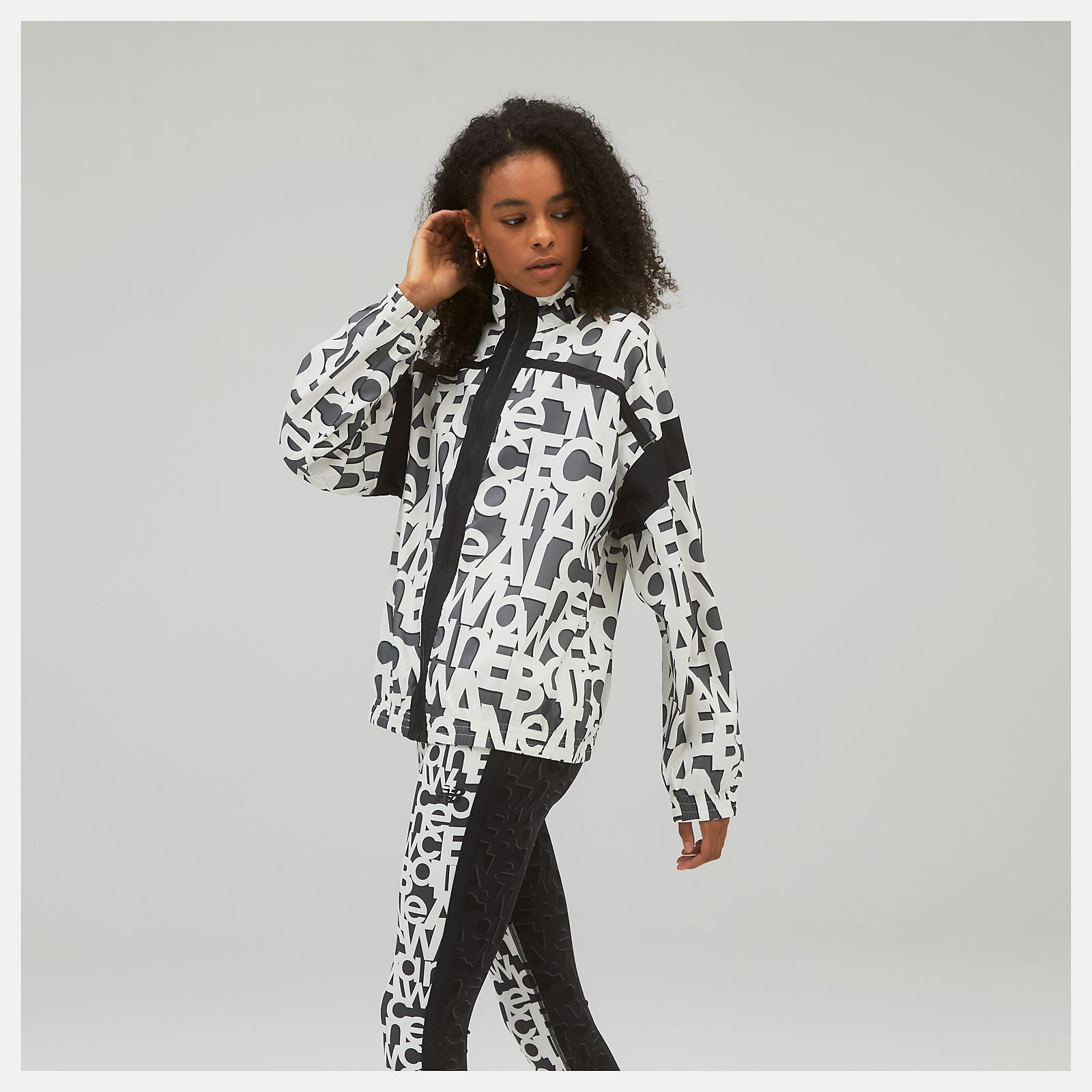 White Relentless Printed Woven Jacket | New Balance Clothing