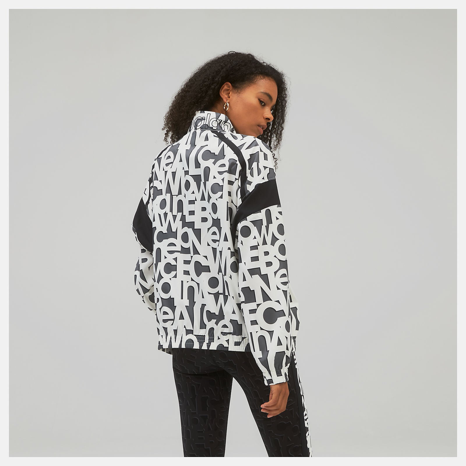 White Relentless Printed Woven Jacket | New Balance Clothing