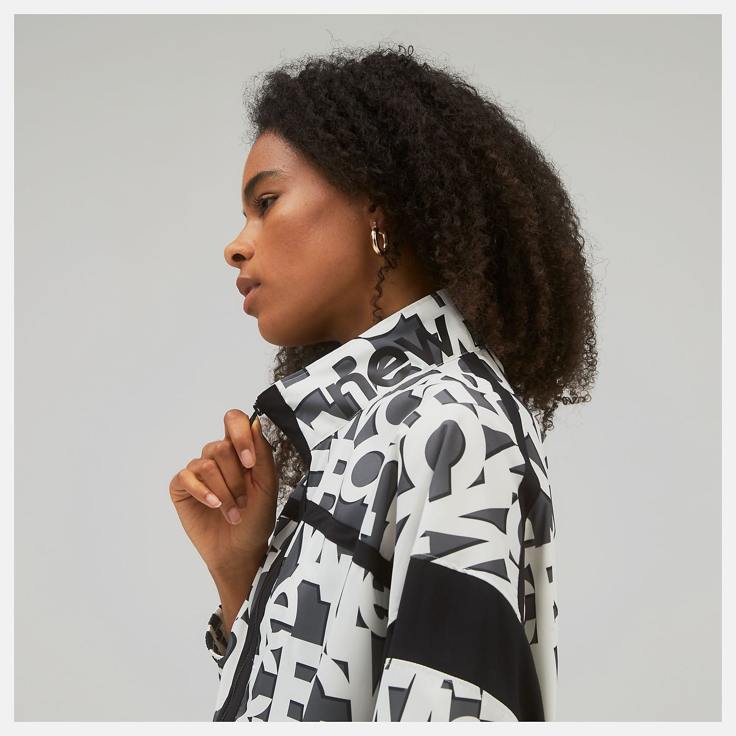White Relentless Printed Woven Jacket | New Balance Clothing