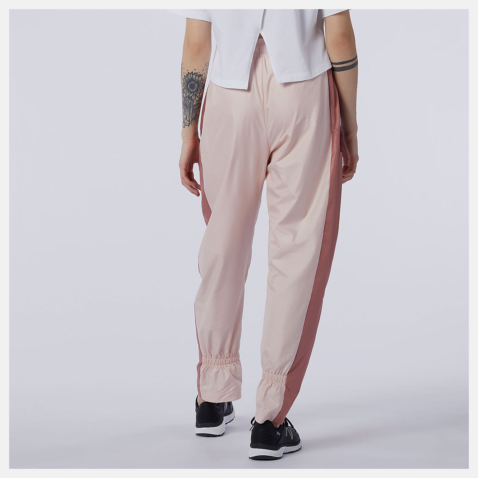 Oyster Pink NB Athletics Higher Learning Wind Pant | New Balance Clothing