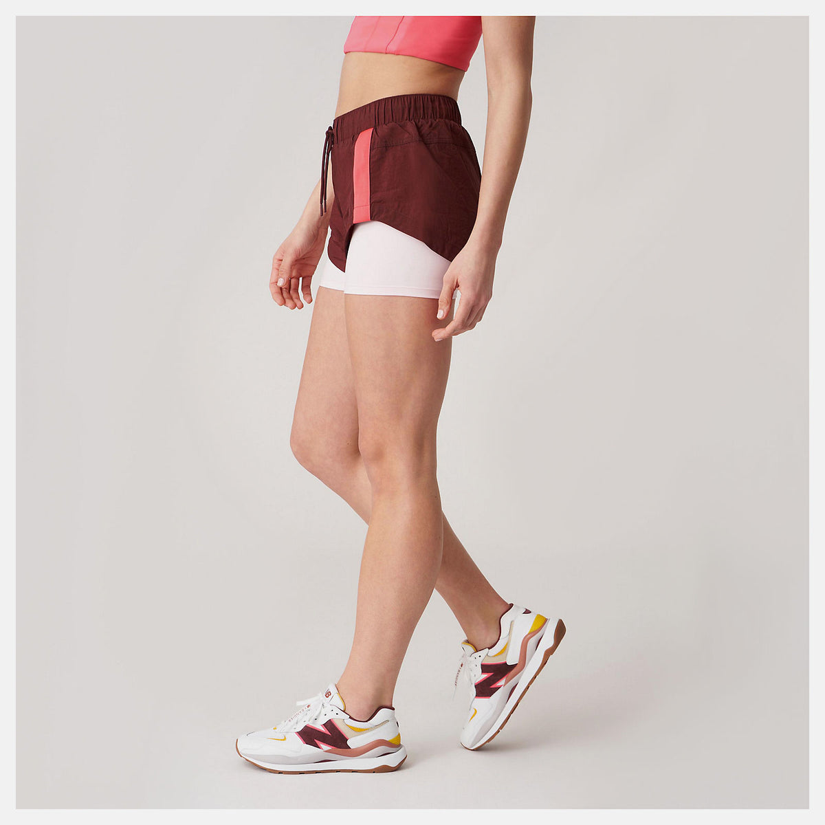 Deep Mauve Bandier Woven tech Short | New Balance Clothing