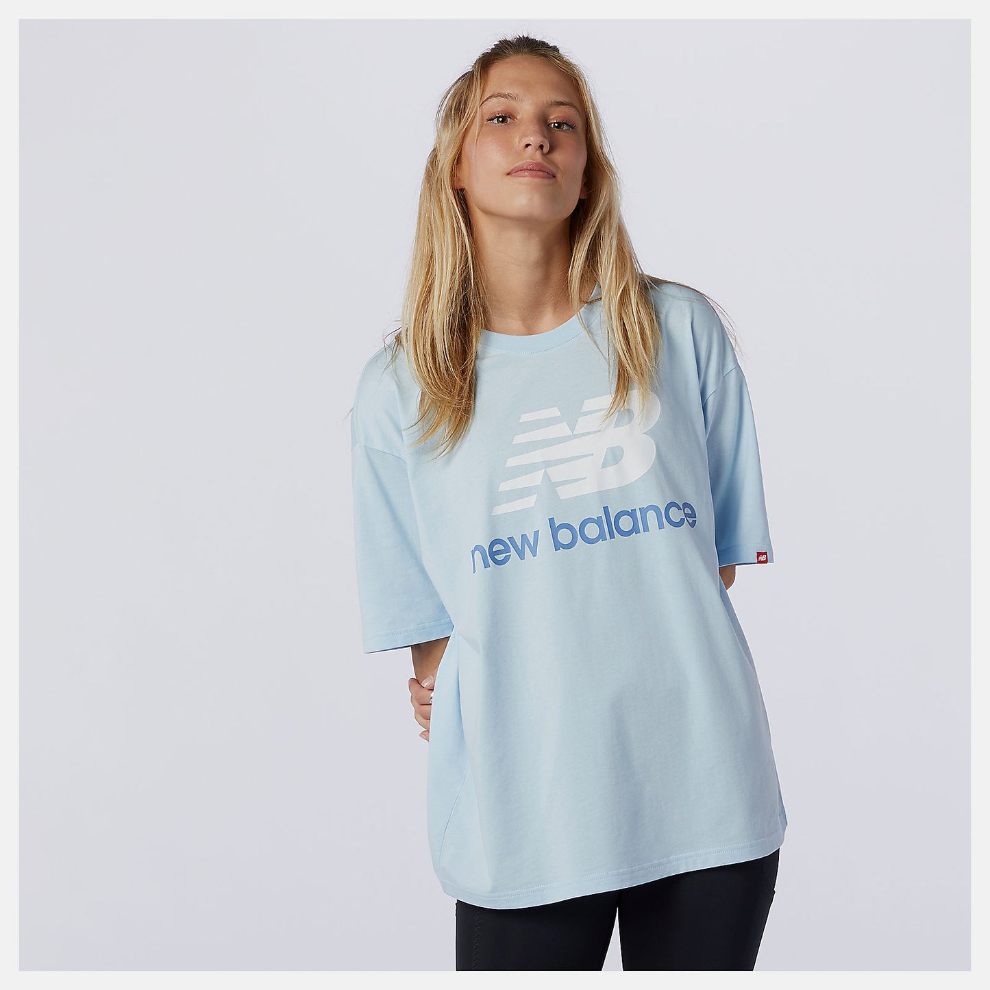 Uv Glo NB Essentials Stacked Logo Tee | New Balance Clothing