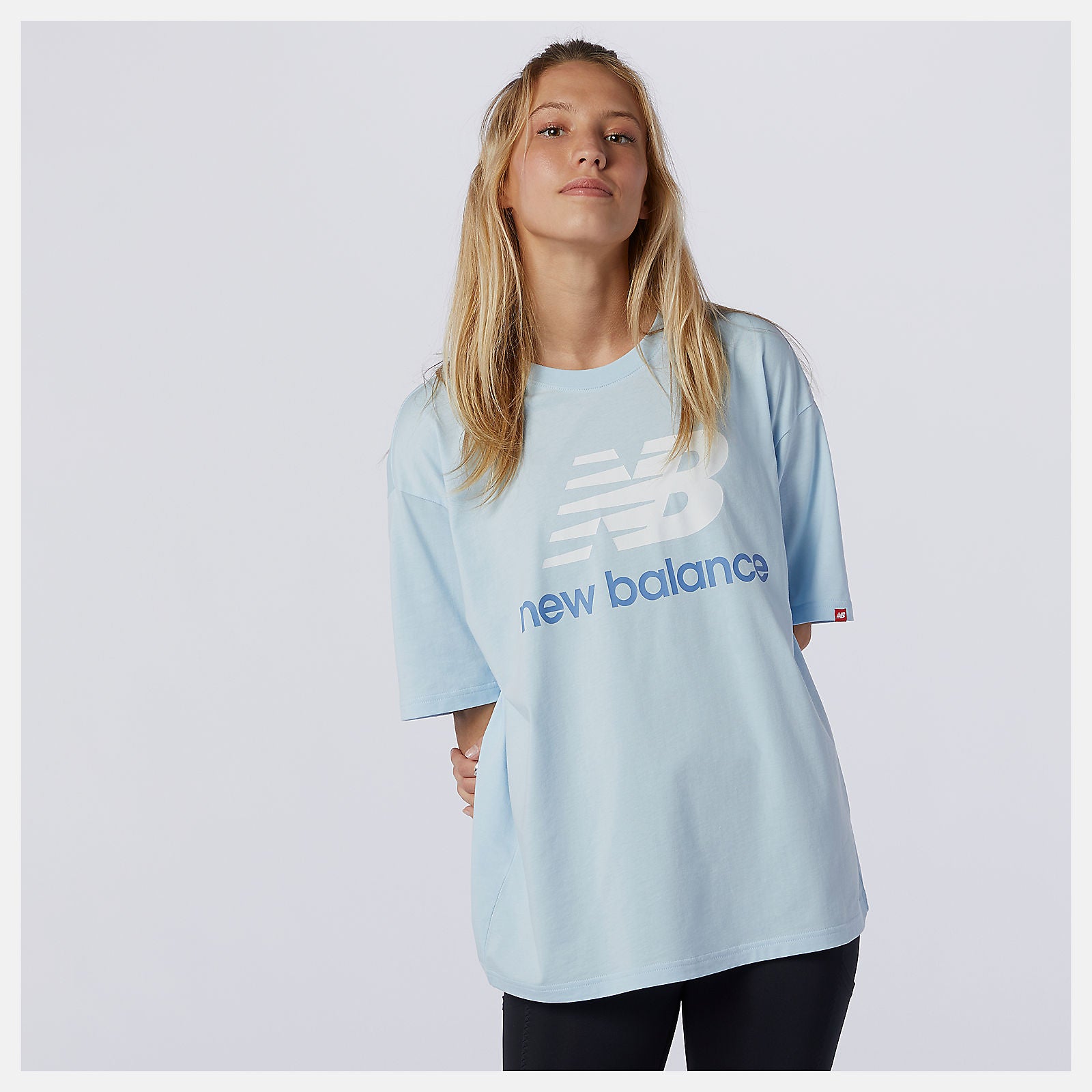 Uv Glo NB Essentials Stacked Logo Tee | New Balance Clothing