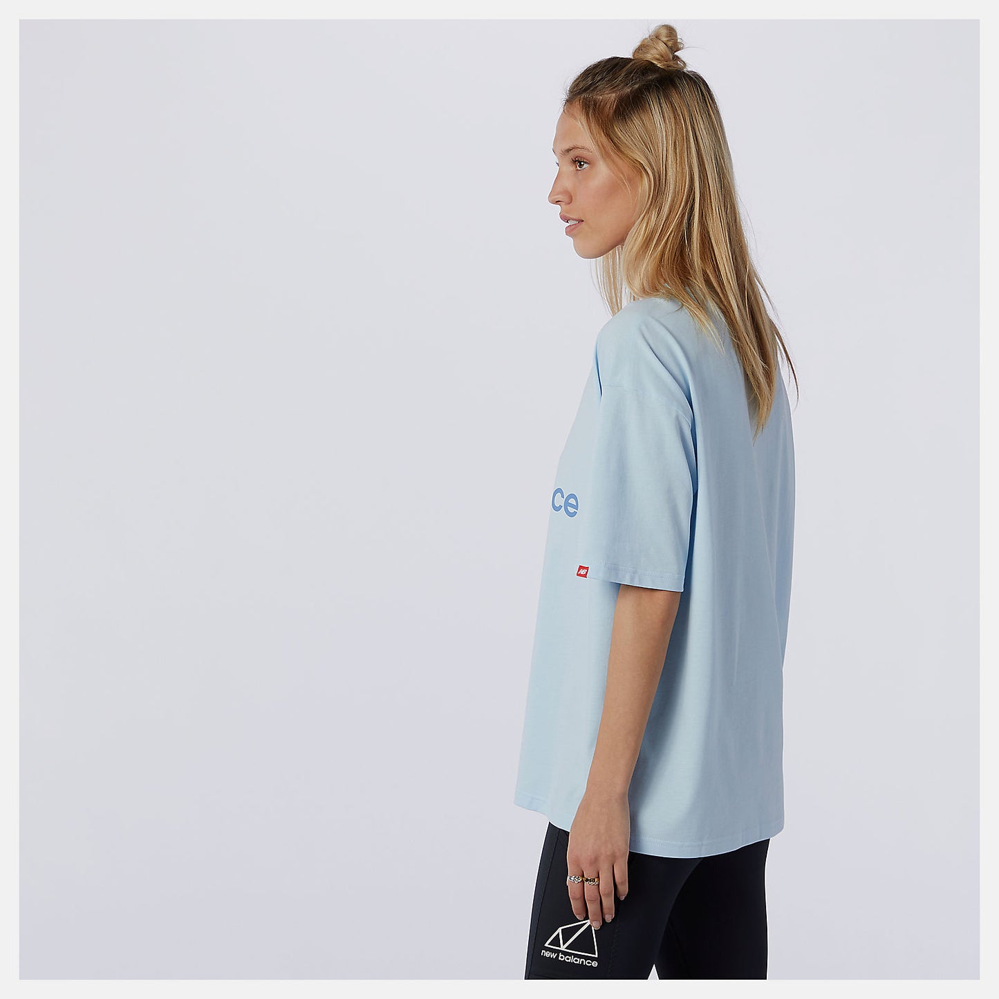 Uv Glo NB Essentials Stacked Logo Tee | New Balance Clothing