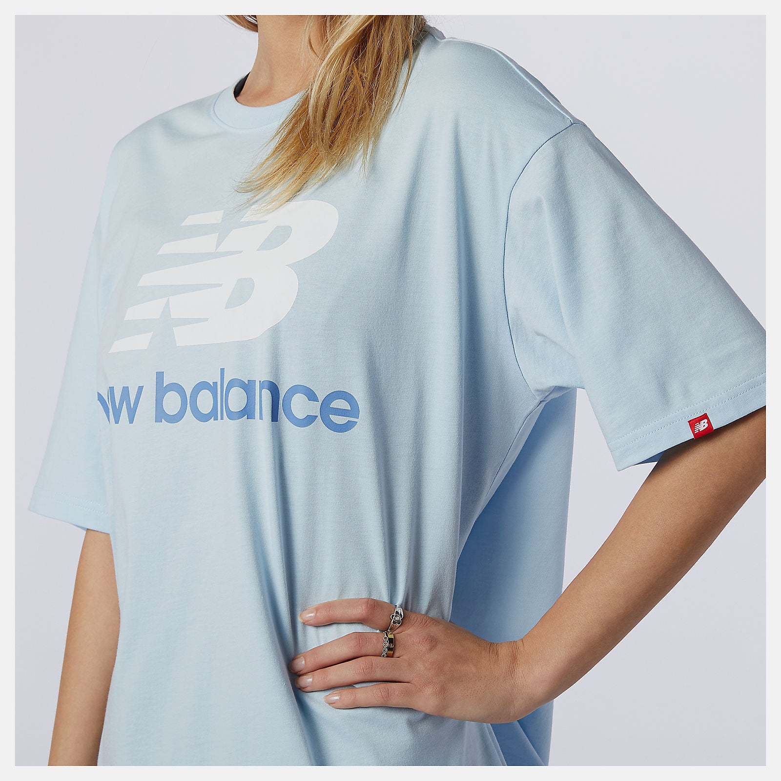 Uv Glo NB Essentials Stacked Logo Tee | New Balance Clothing