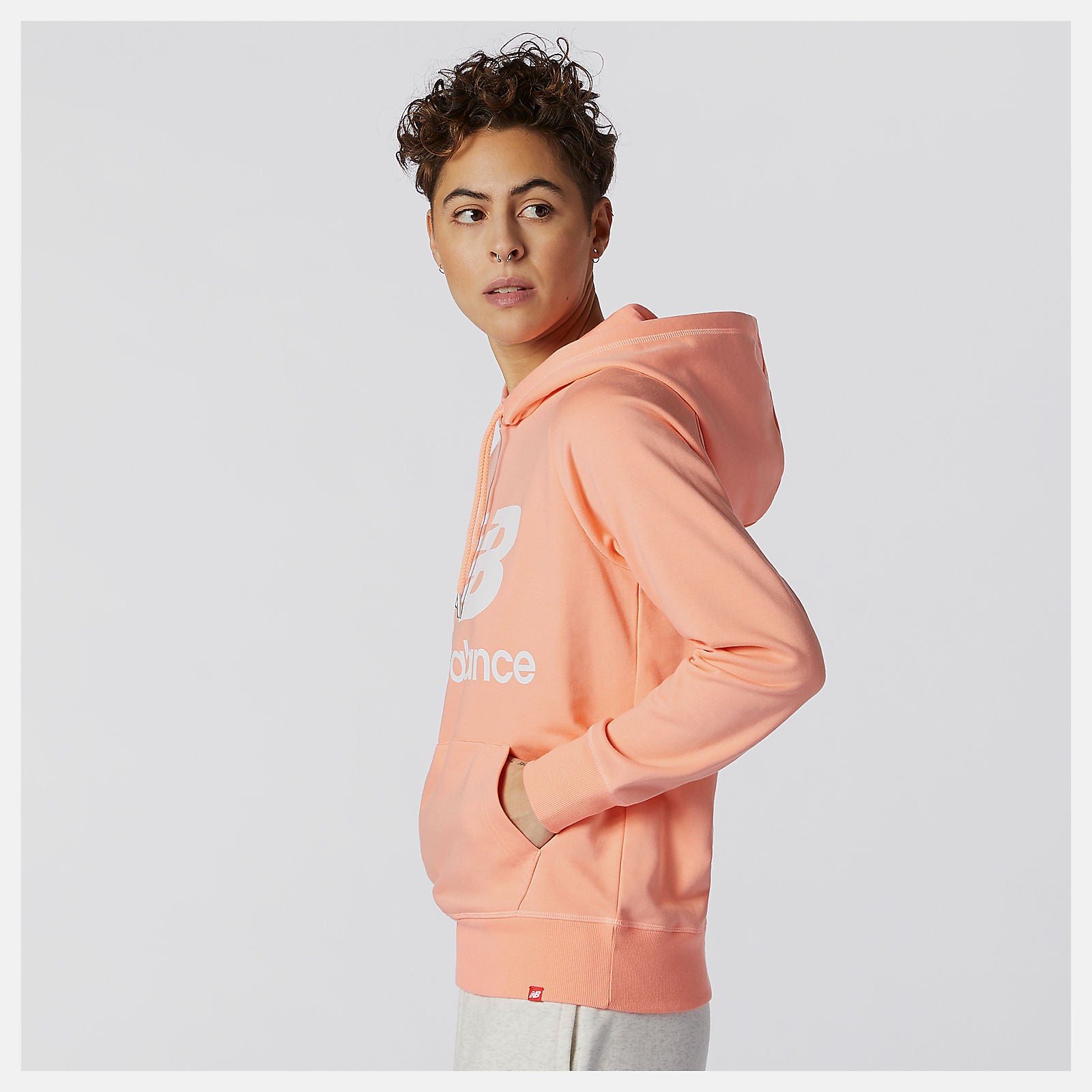 Pink NB Essentials Pullover Hoodie | New Balance Clothing